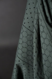 green eyelet embroidered cotton fabric