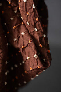 Bandhani tie-dye Indian cotton fabric in rust brown