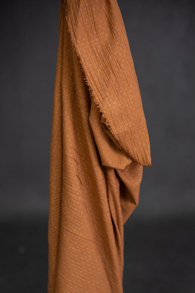 rusty orange cross stitch fabric