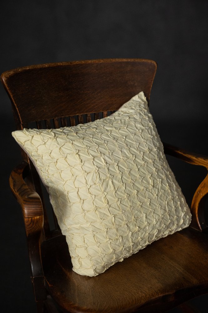 ecru hand smocked cushion