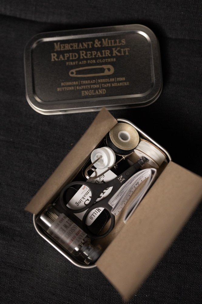 sewing kit in metal tin