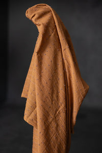 rusty orange loopy indian fabric 